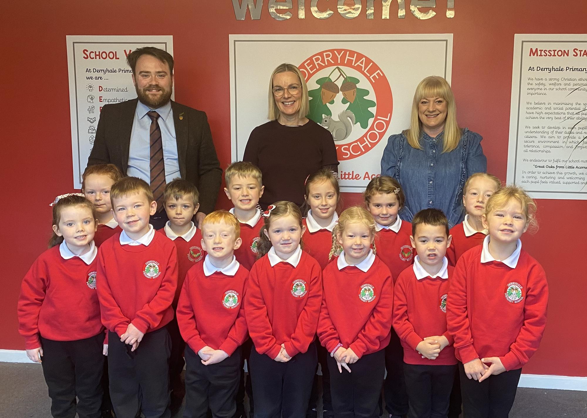 The new P1 class at Derryhale Primary School with Mr Glenny (principal), Mrs McCallen (teacher) and Mrs Vennard (classroom assistant).