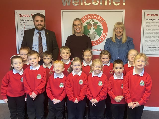 The new P1 class at Derryhale Primary School with Mr Glenny (principal), Mrs McCallen (teacher) and Mrs Vennard (classroom assistant).