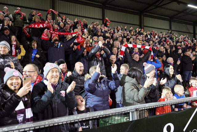 Larne fans celebrate at Seaview on Friday night.  Photo by David Maginnis/Pacemaker Press