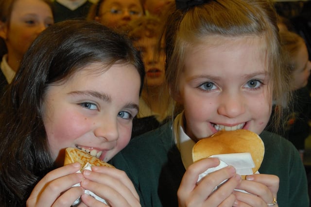 Karen and Darcy tuck into their pancakes along with their fellow P5 pupils during Pancake Day 2013 at St MacNissi's Primary School.
