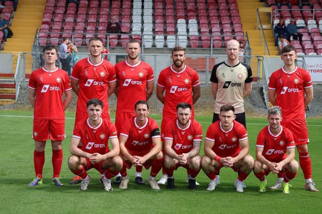 The Ports line up prior to the game.
