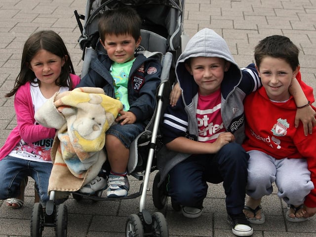 Jenny, Tom, Peter and Jack having fun during the 'Reenactment of life in the Plantation' in Coleraine town centre in 2010 as part of the Coleraine Twelfth Festival.
