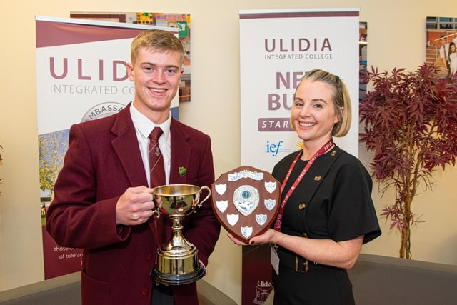 Rhys Miller who was awarded the Leslie Shield and the Conduct Cup pictured with Mrs Ward (head of Pastoral Care).