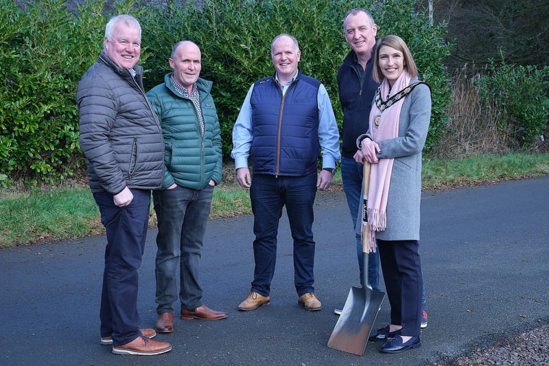 Kieran Quinn, Eddie Quinn and Plunkett McGeary from Pomeroy Plunketts GAA club join Councillor Cathal Mallaghan, Council Chair, Councillor Córa Corry for the start of the Connecting Pomeroy project.