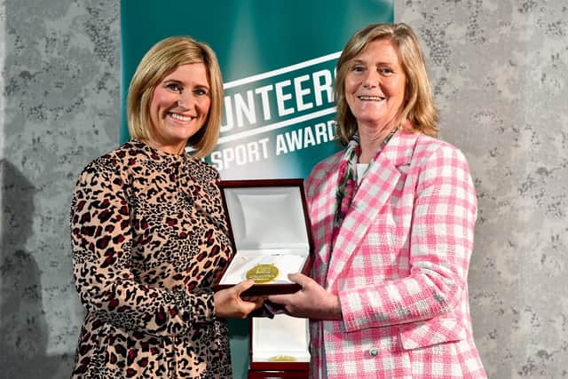 Katie Speers from Ballymoney RFC receives her award from Federation of Irish Sport Chairperson Clare McGrath during the Volunteers in Sport Awards at The Crowne Plaza in Blanchardstown, Dublin
