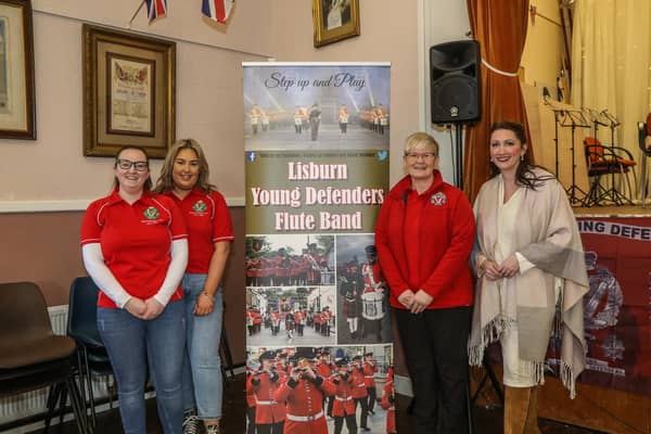 Ladies' from Lisburn Young Defenders where joined at their Festival of Melody Flute Bands by MLA Emma Little-Pengelly. Pic by Norman Briggs, rnbphtographyni