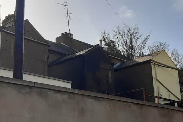 A 12-year-old girl remains in hospital following a house fire in Church St Portadown in the early hours of Tuesday morning. Her mother was found dead at the scene. The PSNI has launched a murder inquiry and one man, aged 25, has been arrested in relation to the incident.