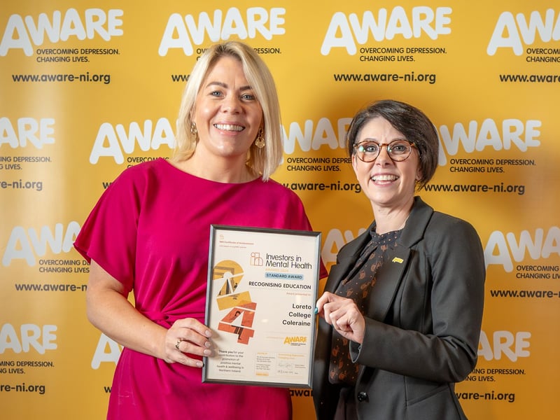 A representative from Loreto College in Coleraine collects their accolade at AWARE NI's Investors in Mental Health Awards. The Castlerock Road school was one of two Coleraine-based schools recognised for their dedication to promoting positive mental health, alongside Dalriada School.The schools integrated AWARE NI’s mental health programmes such as Mood Matters for Young People into their curriculum and also maintained a consistent focus on mental health through initiatives like signposting, appointing mental health champions and creating dedicated mental health spaces.