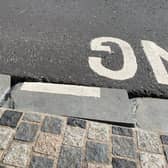 Uneven kerb stone in Dungannon which local MLA Colm Gildernew has asked to be fixed.
