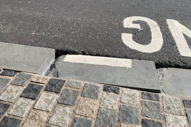 Uneven kerb stone in Dungannon which local MLA Colm Gildernew has asked to be fixed.