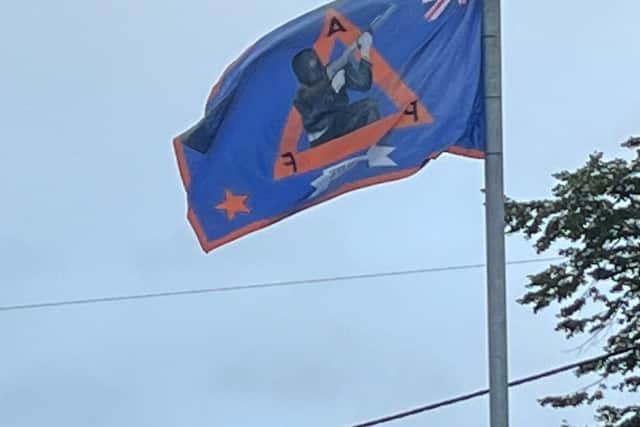Paramilitary flags are being used to intimidate and mark out territory in Lurgan, Co Armagh says Sinn Fein Cllr Keith Haughian who sits on Armagh, Banbridge and Craigavon Council.