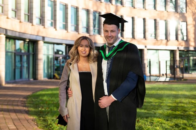South West College (SWC) Dungannon campus graduate Eamonn Gourley from Rock, with his partner celebrating his achievements on the Ulster University Foundation Degree in Engineering (with specialisms)