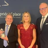 Alan McDowell, founder of Portadown Wellness Centre, and Business Development Manager Linda Robinson pictured at the IPB Pride of Place awards ceremony with Roger Wilson, Chief Executive of ABC Borough Council.