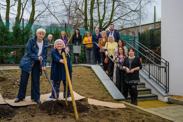 A tree was planted in the centre’s garden by founding members.