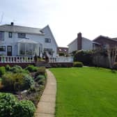 The impressive detached home has spacious gardens to both the front and rear.  Photo: Brian A Todd estate agents