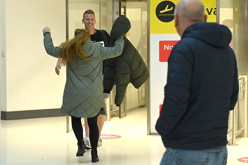 Mum Tara gives son Kyle O’Neill a warm welcome at George Best Belfast City Airport as he arrives home after being away for two years in Australia.