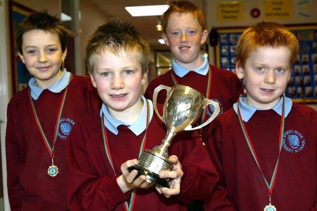 Ross and Matthew Lightbody with Pond Park PS Boys badminton teammates Calum McCandless and Ryan Getty  after winning the Ulster Primary Schools' League in 2007