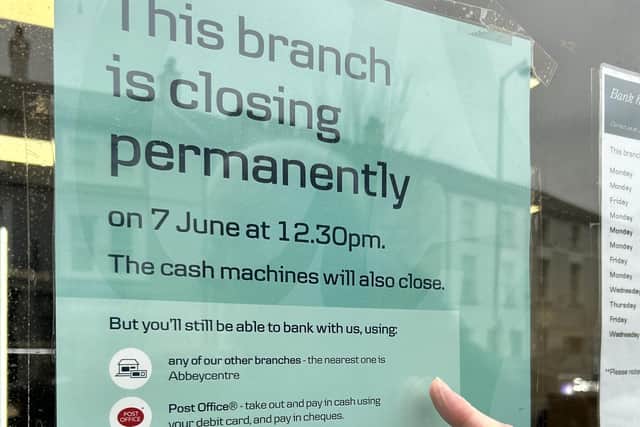 A notice to customers on the window of the Danske Bank in Carrickfergus.  Picture: East Antrim Alliance
