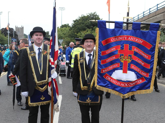Pausing for a photo at the 'Last Saturday' parade.