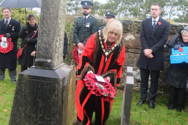 Deputy Mayor Cllr Margaret Anne McKillop lays a wreath on Remembrance Sunday at the war graves at Bonamargy Friary.
