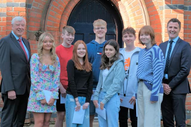 Lurgan College pupils who achieved 11A*/A grades, Lyla-Grace Thompson (Waringstown PS), Harry Hutchinson (Waringstown PS) Ruby McAllister (King’s Park PS), Joshua Serplus (Waringstown PS), ), Lucy Given (King’s Park PS), Dovydas Capas (King’s Park PS) and Hannah Kinloch (King’s Park PS). They are pictured with Mr Barry Mulholland, Chairperson of the Education Authority and Mr Kyle McCallan, Headmaster.