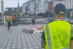Slaine Browne (on the skateboard) with Dr Jim Donaghey (back to the camera) working on the ramps at Station Square in Portrush. Photo credit Wesley McMullen.