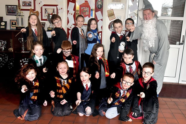 Spellbinding...Harry Potter was very popular amongst pupils of St John The Baptist Primary School who dressed as their favorite book character for World Book Day with even the principal, John McComb, right, dressing as Professor Dumbledore.. PT10-219.