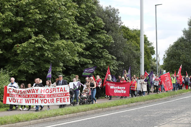 Campaigners make their way from Causeway Hospital to the town centre on Saturday.