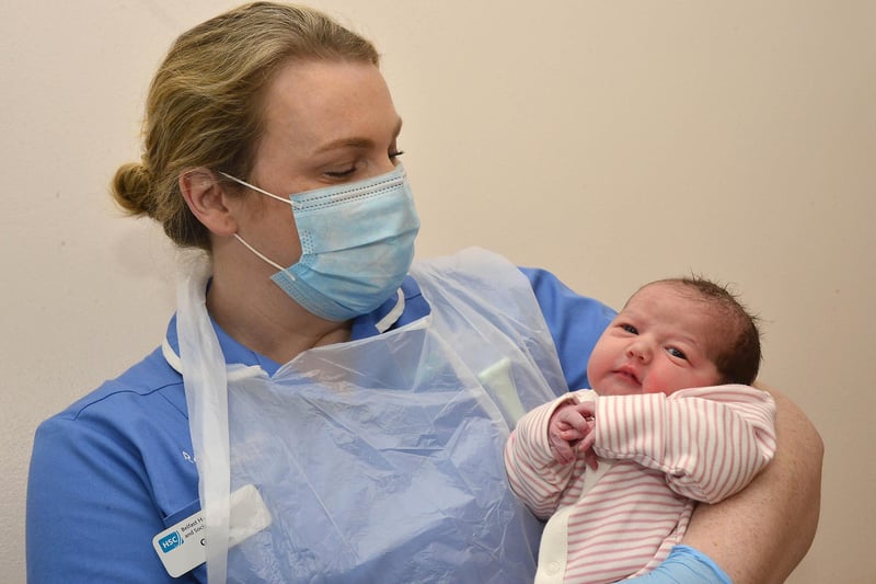 Stacy Rooney from Lisburn had a baby girl at 03.04am on Christmas day, pictured with midwife Grainne Holland at the Royal Victoria Hospital in Belfast.