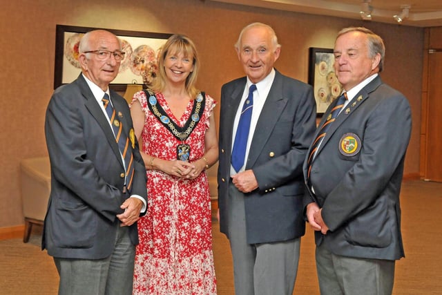 Lord Mayor, Councillor Margaret Tinsley chats with Bobby Ruddell, Leslie Wylie and Alan Roberts who are three of the longest serving members of Lurgan Bowling Club.