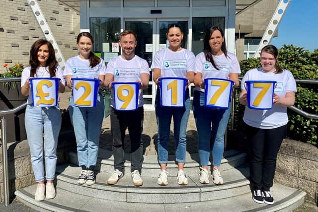 Members of the Southern Area Hospice fundraising team showcasing their final total. From left: Bernie Murphy, Lizzie McCullough, James McCaffrey, Sarah O’Hare, Laura Rowntree and Lauren Trimble.