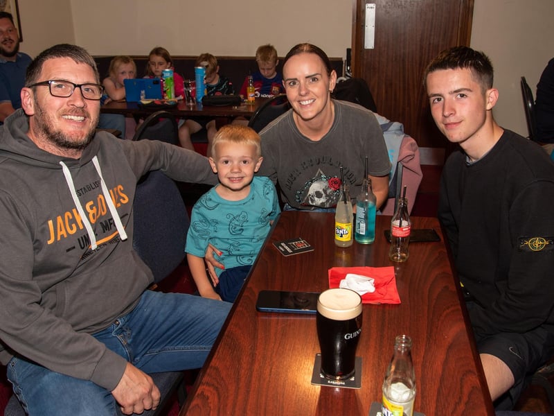 The Dalzell family turned out to show their support for local swimmer, Daniel Wiffen at the watch party in Byrne's Bar, Magheralin. Included are, dad, George, Ross (5), mum, Sara and Matthew. LM32-204.