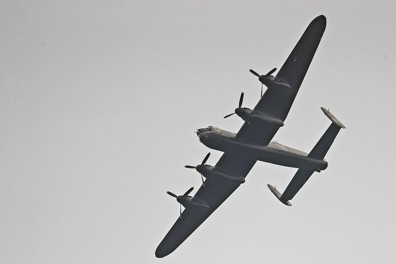 All eyes were skyward for the  Lancaster bomber flight over Larne. Credit: MCAULEY_MULTIMEDIA