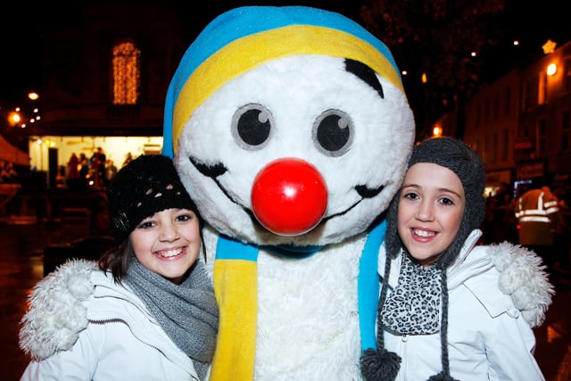 The Snowman pictured with Karen and Emma at the switching on of the Christmas lights in Coleraine in 2010