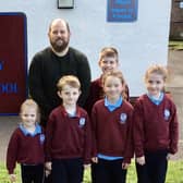 Upper Ballyboley PS Principal Mr Stringer alongside pupils shortly after he was appointed head teacher at the Braepark Road school. (Pic: Contributed).