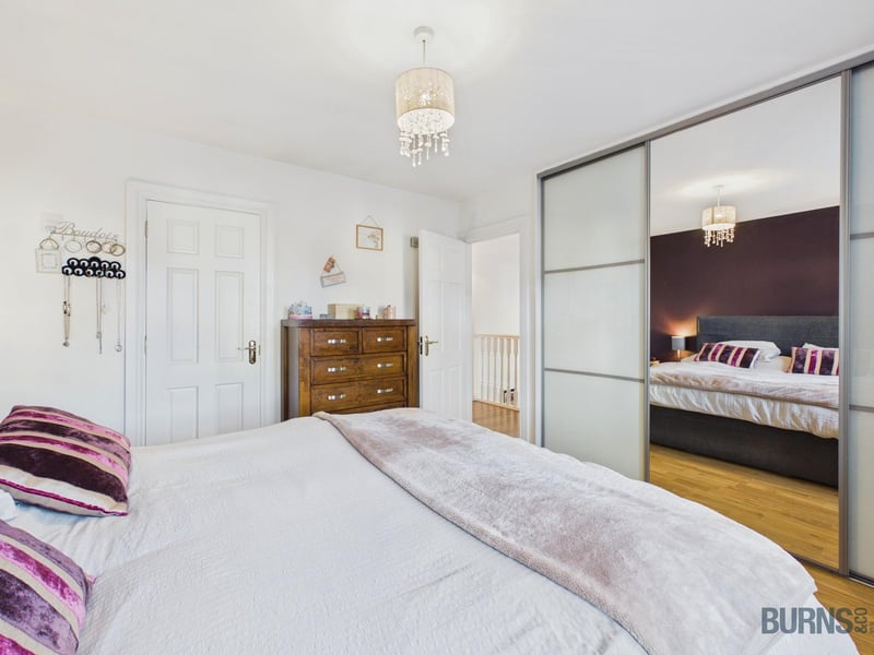 Spacious principal bedroom with its own private en-suite shower room.