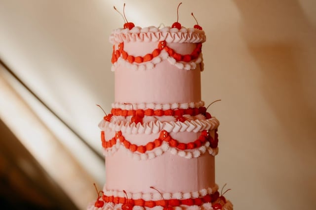 Amy and Christopher had a beautiful three-tier, intricate wedding cake.Credit: Iain Irwin Photography