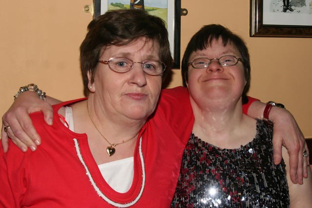 ARM IN ARM...Caroline Boreland and Dianne Clock pictured at the Coleraine Royal British Legion on New Year's Eve in 2010