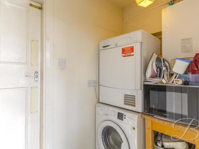 Just off the kitchen/diner is this small but useful utility room, where there is space for a washing machine and tumble dryer. For added convenience, it also has a door leading nicely into the property's attached garage.