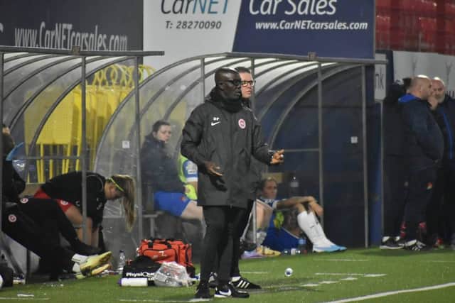 Donald Malomo-Paris on the touchline for Larne's first home game of the season.