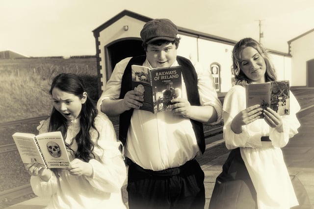 Phyllis (Kellyann McKillen - left) is rather surprised by her book on trains! Meanwhile Peter (Patrick Connor) and Chloe Freeman-Wallace (Bobbie) enjoy more conventional train titles.