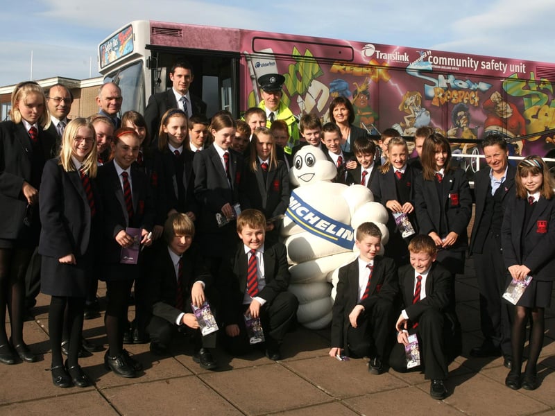 Pictured in 2007 are Noel Doran (teacher), John Donnelly (teacher), Suzanne O'Neill (Safety Bus Co-ordinator), Michael Murray (Safety Bus Co-ordinator), Inspector Steven Reid and Sharon Mullan (Communication Manager Michelin), with pupils from the Ballymena Academy and the Translink safety bus. BT41-200AC