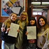 Edan and Yousha celebrate GCSE results at Laurelhill with family