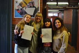 Edan and Yousha celebrate GCSE results at Laurelhill with family