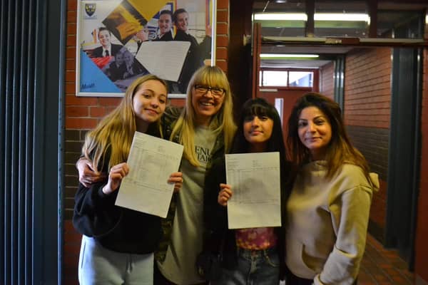 Edan and Yousha celebrate GCSE results at Laurelhill with family
