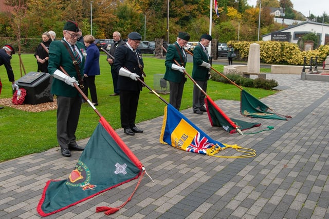 Standard bearers taking part in the dedication and unveiling service.