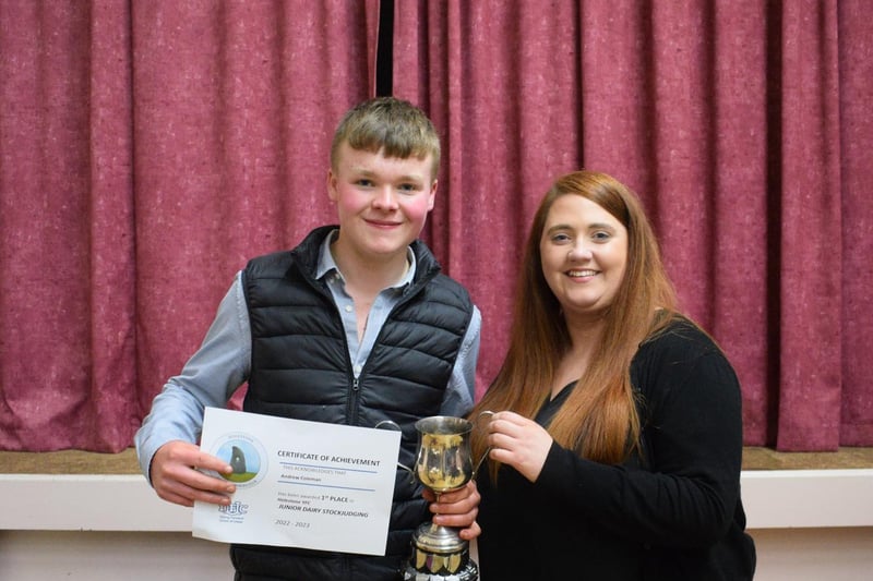 Andrew Coleman collecting his junior Dairy Stockjudging prize.