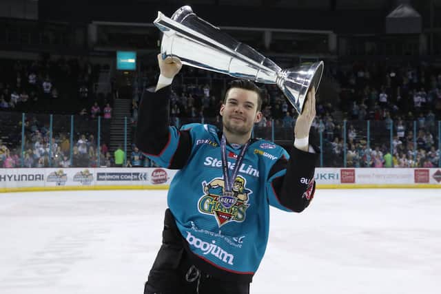 Returning Belfast Giants Josh Roach pictured with the Elite Ice Hockey League trophy.  Photo by William Cherry/Presseye