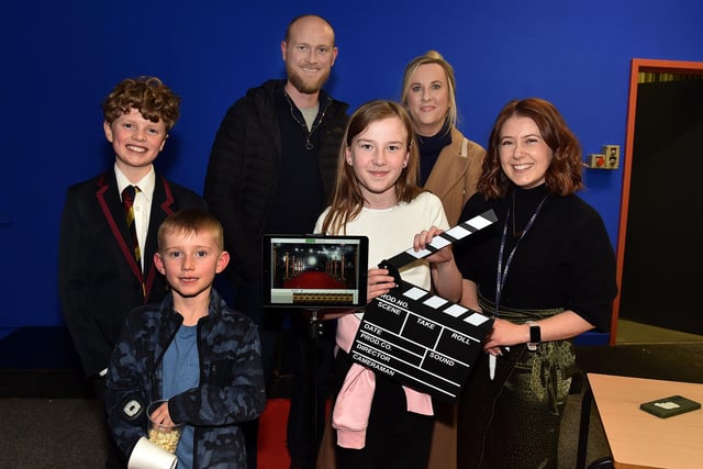 Pictured in the Drama department during the  Lurgan Junior High School open night are from left, Connor Garvin, present pupil; Leo Moore (7), dad James, Jasmine Moore (10), mum Carol and Grace Smith, head of Drama. LM02-202.
