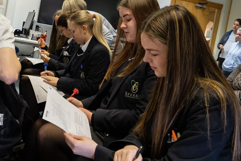 Students completing quiz for prizes at the 'Bring IT On' event. Pic: Chris Neely